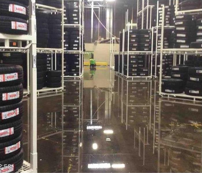 Concrete floor flooded with water
