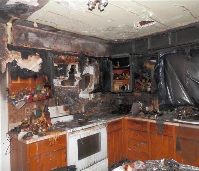 A kitchen completely burnt by fire